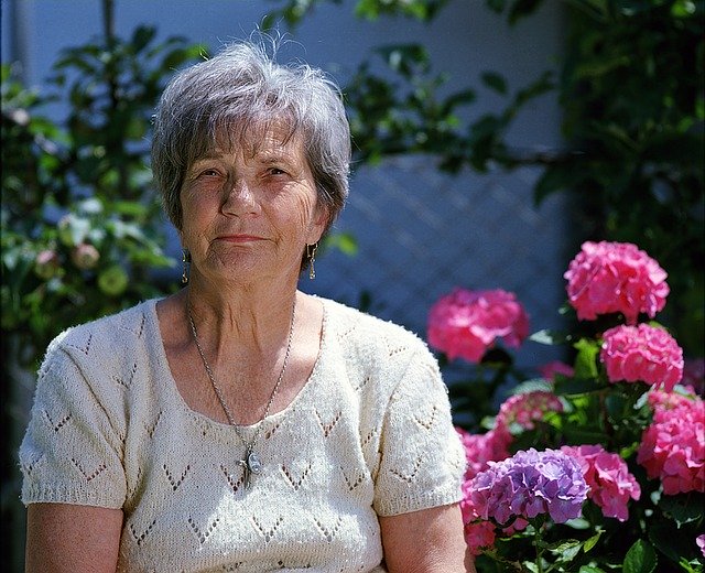 Elderly Lady in her garden